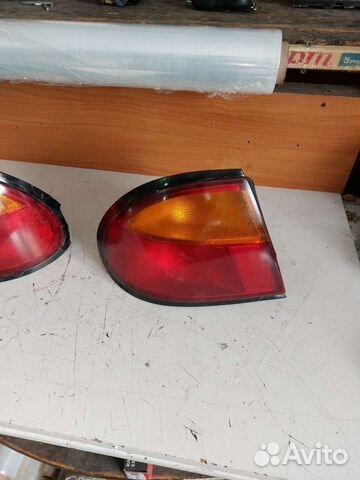 Фонарь задний Mazda 323
