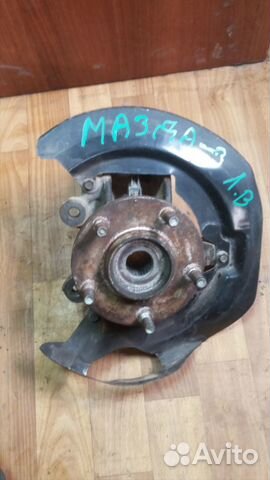 Кулак поворотный левый мазда 3 вк 1.6 L
