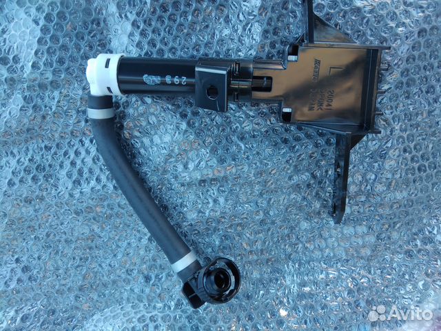 Форсунка омывателя фар Subaru левая SH 86636SC010 Форсунка омывателя фар Subaru левая SH 86636SC010