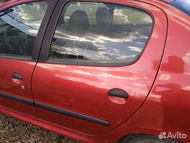 Дверь задняя левая Пежо 206