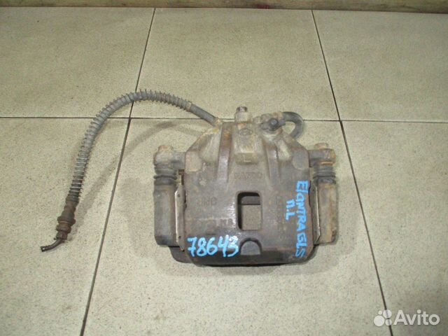 Суппорт передний левый Hyundai Elantra 3 (XD)