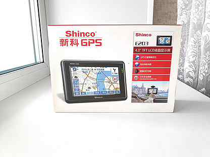 Shinco E203 - автомобильный GPS-навигатор