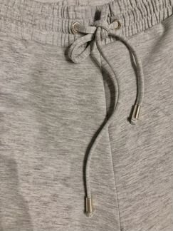 Спортивные брюки палаццо с разрезом трикотажные