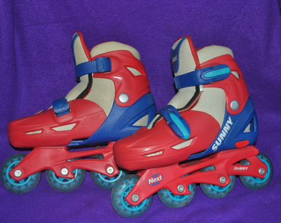 Роликовые коньки