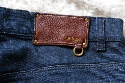 Джинсы клеш Prada